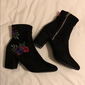 Black suede ankle booties w/ floral print